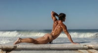 Parsvottanasana. Pyramid-Pose. Yogi. Greek athlete, sweaty muscle yoga on wet marble 50s